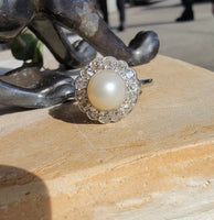 Platinum Edwardian pearl & diamond halo ring