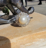 Platinum Edwardian pearl & diamond halo ring