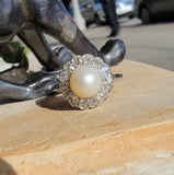 Platinum Edwardian pearl & diamond halo ring