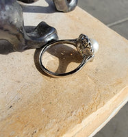 Platinum Edwardian pearl & diamond halo ring