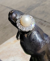 Platinum Edwardian pearl & diamond halo ring