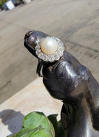 Platinum Edwardian pearl & diamond halo ring