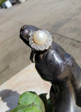Platinum Edwardian pearl & diamond halo ring