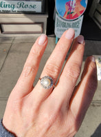Platinum Edwardian pearl & diamond halo ring