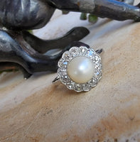 Platinum Edwardian pearl & diamond halo ring