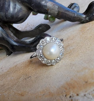Platinum Edwardian pearl & diamond halo ring