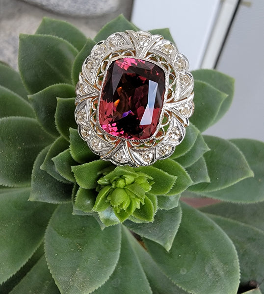 Platinum & gold pink tourmaline & diamond halo estate ring