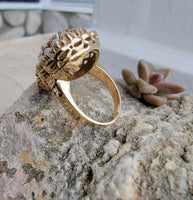 14k gold pink sapphire, enamel, and pearl halo estate flower ring