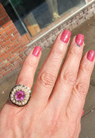 14k gold pink sapphire, enamel, and pearl halo estate flower ring