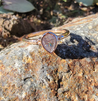 14k rose gold pear cut diamond bezel set solitaire  .50 ct