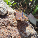 14k rose gold pear cut diamond bezel set solitaire  .50 ct