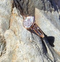 14k rose gold pear cut diamond bezel set solitaire  .50 ct