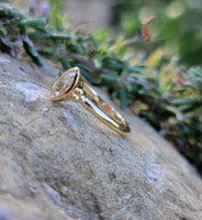 14k gold marquise cut diamond bezel set solitaire engagement ring