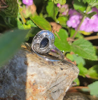 platinum cabochon blue sapphire halo estate ring