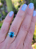 14k white gold emerald cut blue zircon & baguette diamond estate ring