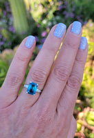 14k white gold emerald cut blue zircon & baguette diamond estate ring