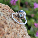 platinum European cut diamond & blue sapphire halo target ring