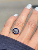 platinum European cut diamond & blue sapphire halo target ring