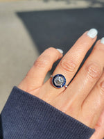 platinum European cut diamond & blue sapphire halo target ring