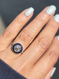 platinum European cut diamond & blue sapphire halo target ring