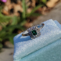platinum emerald & diamond halo estate ring