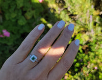 platinum emerald & diamond halo estate ring
