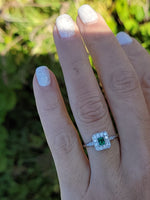 platinum emerald & diamond halo estate ring