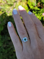platinum emerald & diamond halo estate ring