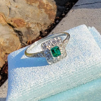 platinum emerald & diamond halo estate ring