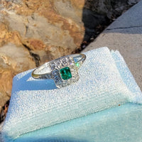 platinum emerald & diamond halo estate ring