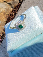 platinum emerald & diamond halo estate ring
