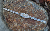 platinum & 14k white gold c.1920's Art Deco filigree diamond & emerald arrow bracelet