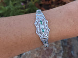 platinum & 14k white gold c.1920's Art Deco filigree diamond & emerald arrow bracelet