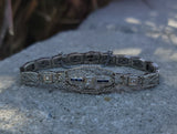 14k white gold c.1920's Deco filigree diamond & blue sapphire bracelet