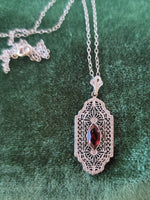 10k white gold c.1920's filigree garnet pendant necklace