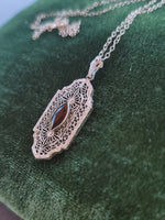 10k white gold c.1920's filigree garnet pendant necklace