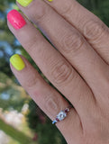 Platinum estate diamond & ruby ring