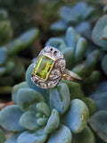 14ct gold two tone emerald cut peridot & diamond estate ring