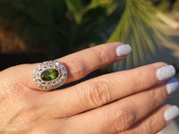 platinum top & 14k gold two tone green tourmaline & diamond estate antique halo ring