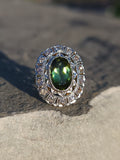 platinum top & 14k gold two tone green tourmaline & diamond estate antique halo ring