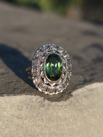 platinum top & 14k gold two tone green tourmaline & diamond estate antique halo ring