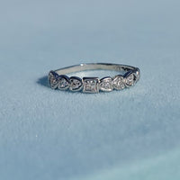 Platinum Art Deco vintage 7 diamond wedding band