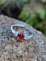 18k white gold emerald cut orange sapphire & diamond estate ring