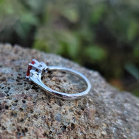 18k white gold emerald cut orange sapphire & diamond estate ring