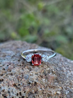 18k white gold emerald cut orange sapphire & diamond estate ring