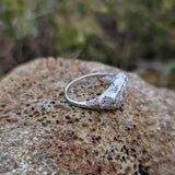 14k gold white gold c.1920's filigree 3 diamond ring - apx .10ct tw