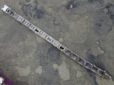 10k white gold c.1920's Deco filigree aquamarine & black onyx bracelet