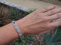 10k white gold c.1920's Deco filigree aquamarine & black onyx bracelet