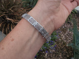 10k white gold c.1920's Deco filigree aquamarine & black onyx bracelet