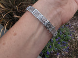10k white gold c.1920's Deco filigree aquamarine & black onyx bracelet